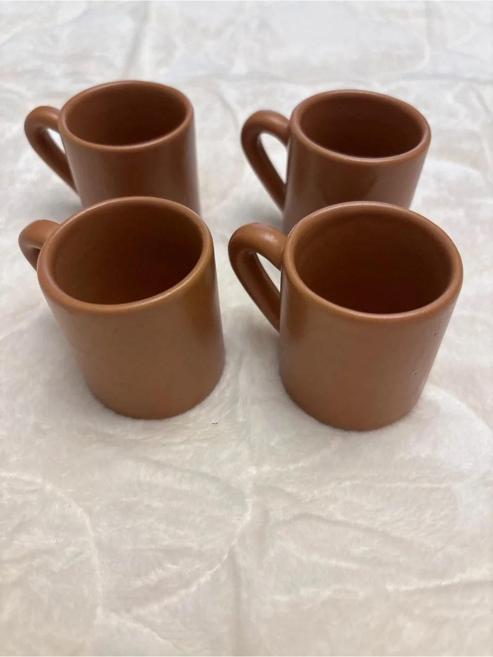 Four brown stoneware pottery expresso shot coffee mugs